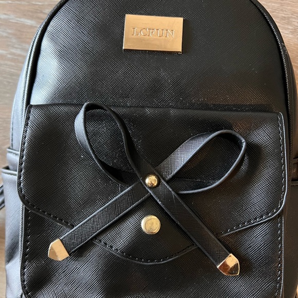 Mini strap backpack - Picture 2 of 3